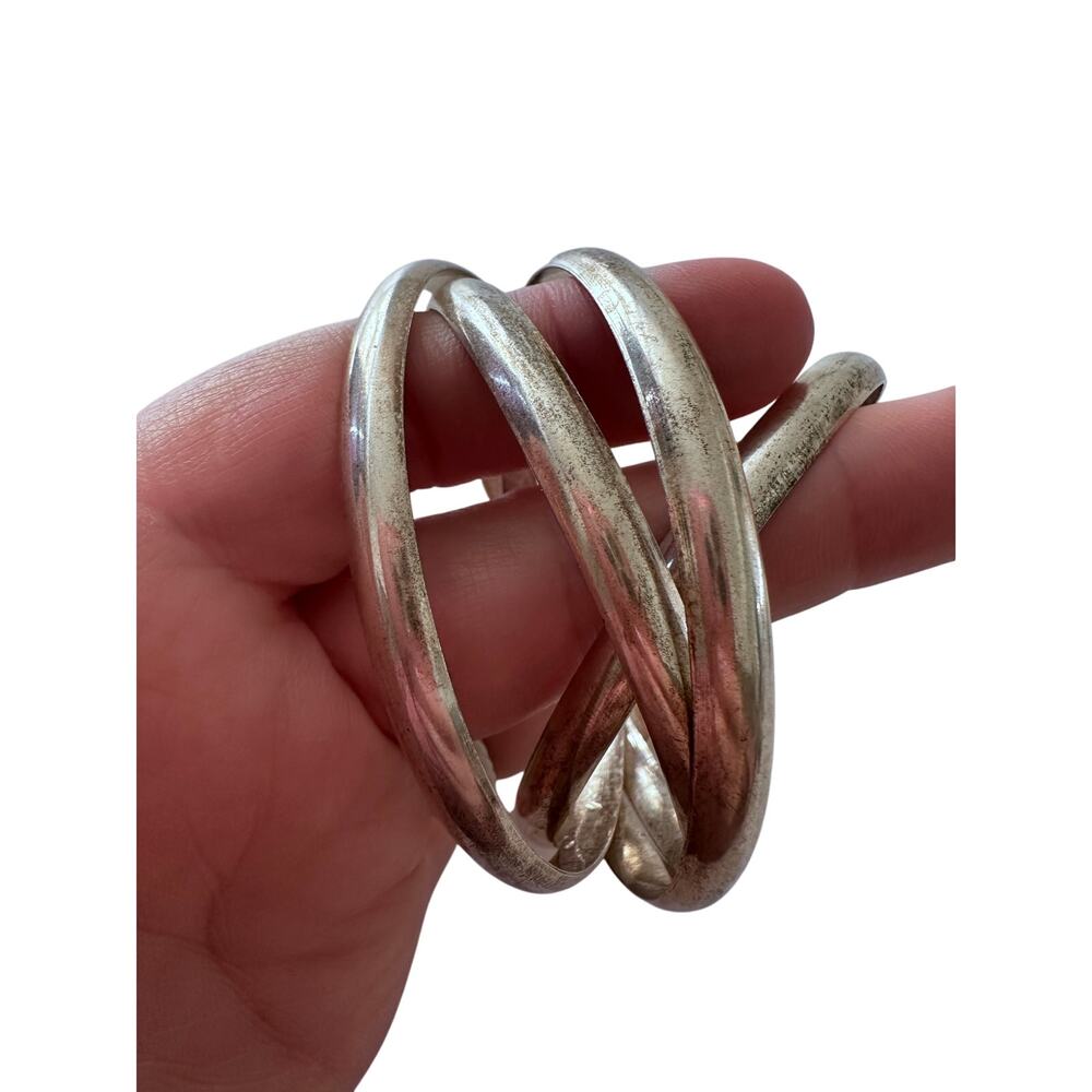 Elegant Silver Bangle Bracelet Set - 4 Piece attached
